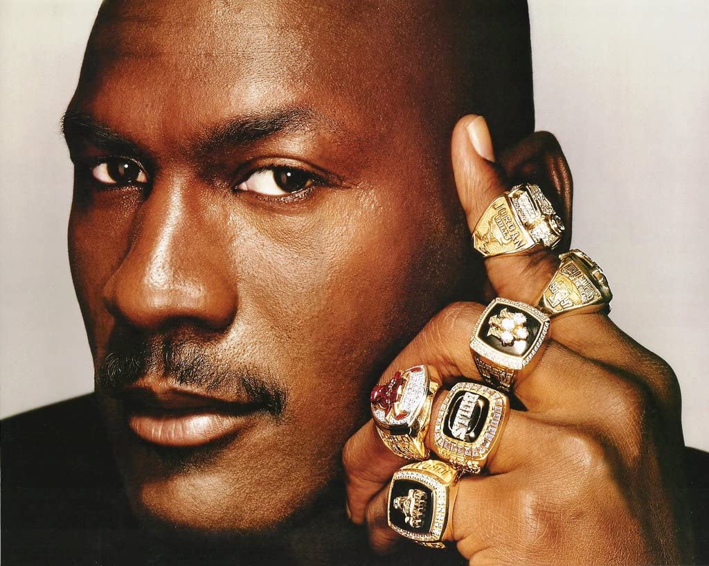 Michael Jordan showing off his 6 championship rings!